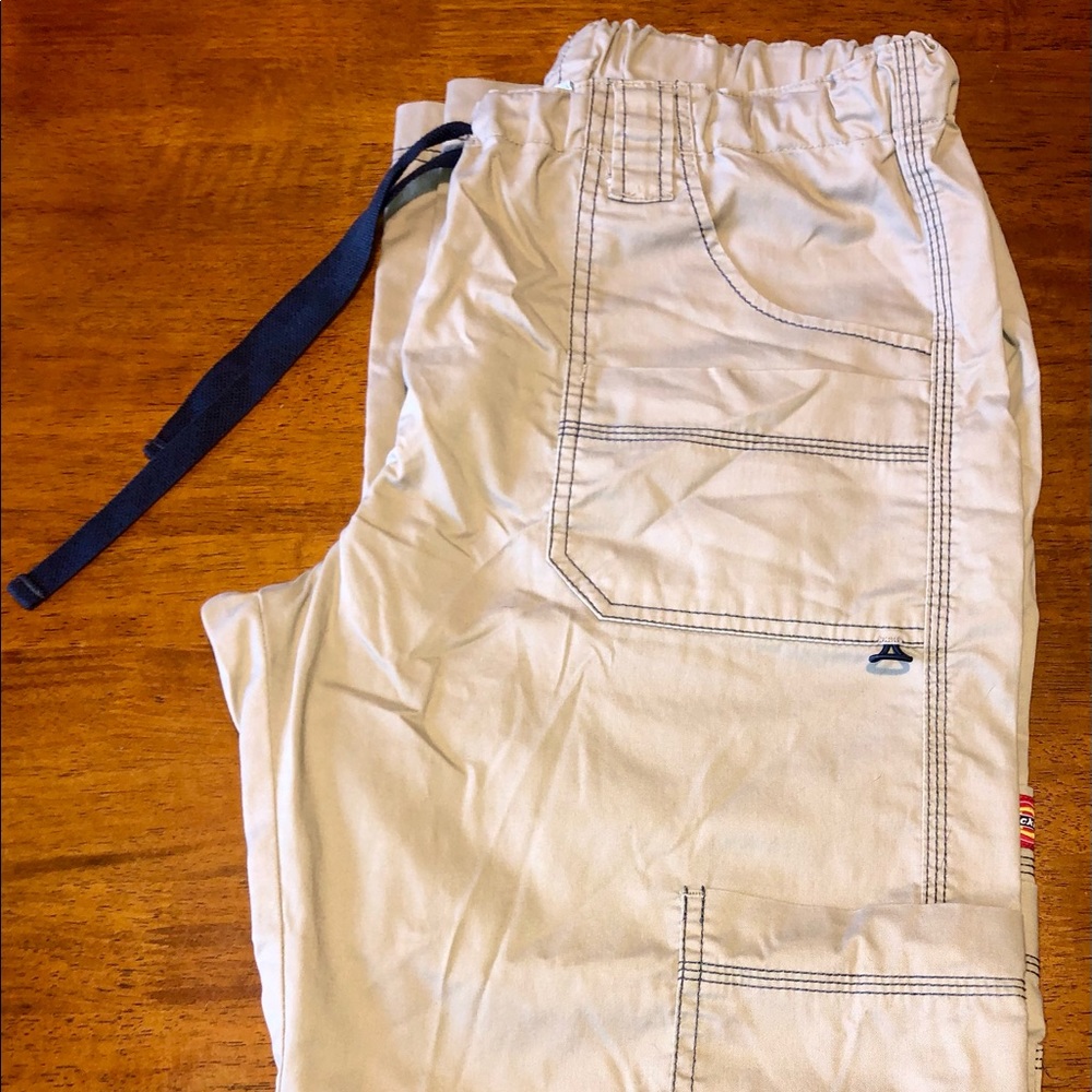 Dickies scrub pants in tan. Size M tall.
